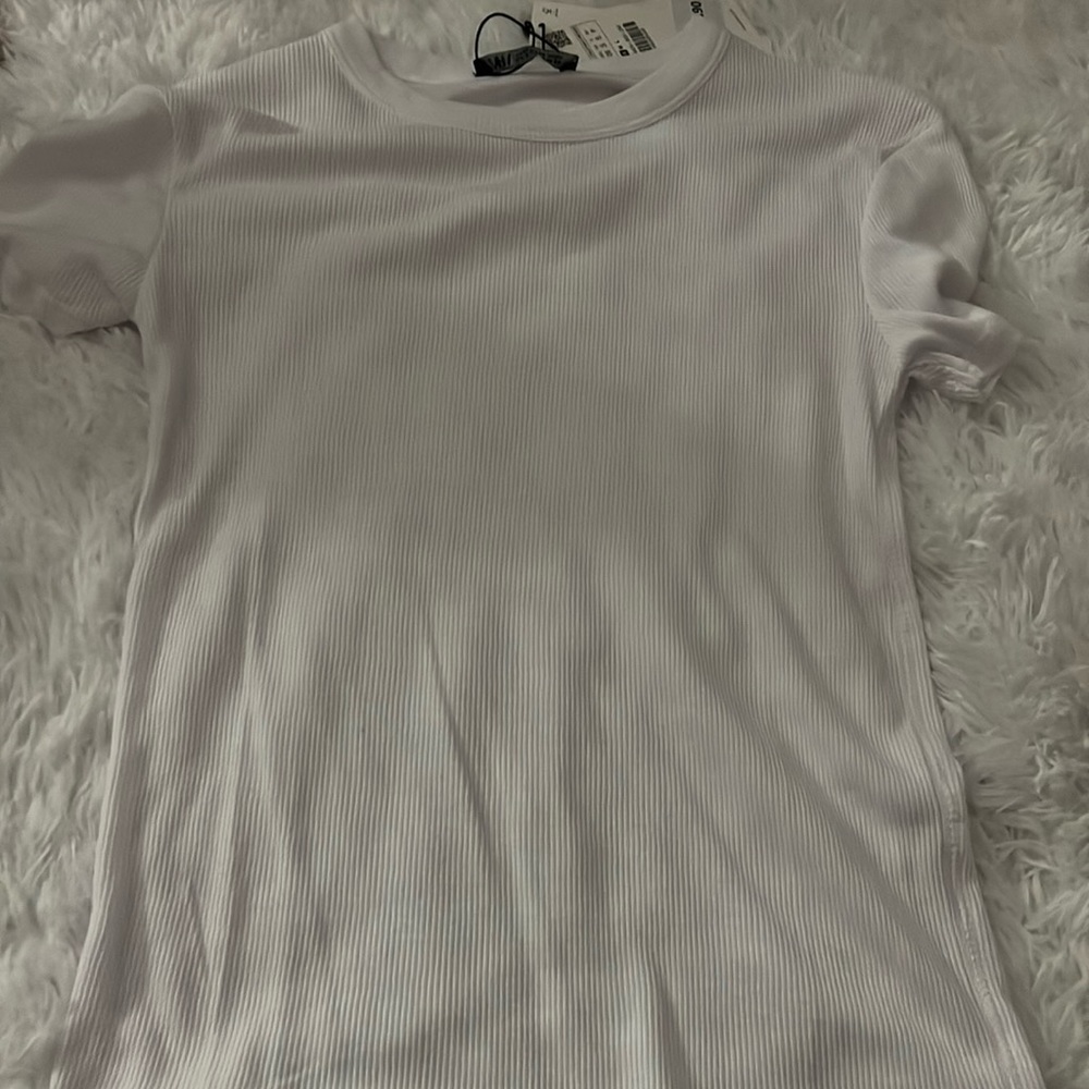 White shirt from zara, perfect condition never worn.